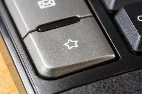 A simple star symbol icon button, favorite bookmark key, liking, adding to .. Stock Photos