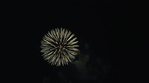 Simple starbursts and complex designs in a fireworks display Stock Footage 59516918