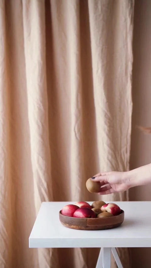 Simple still life scene with fresh apples on a white table Video stock 343906601