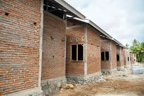 Simple subsidized housing complex construction process. house Construction Stock Photos
