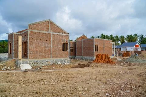Simple subsidized housing complex construction process. house Construction Stock Photos