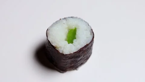 A simple sushi piece rotating 4k 30fps Stock Footage 260503057