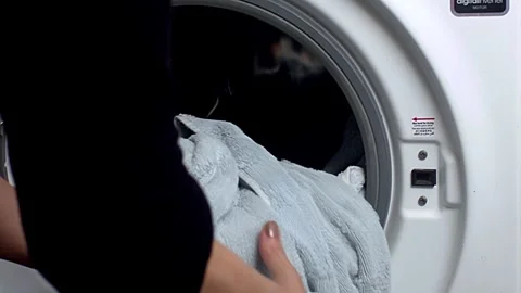 Simple task, but it feels so fine, fresh laundry done, it’s drying time Stock Footage 293463100