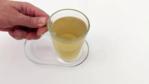Simple Tea Setup with Transparent Cup and Saucer, Bright Mood Stock Footage 321725207