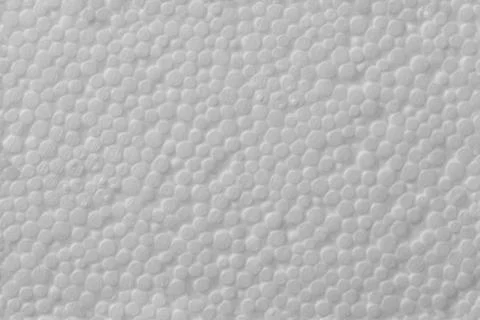Simple texture of white polystyrene foam or styrofoam, close-up flat white on Foto stock