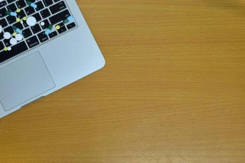 Simple top view of computer have medicine drug pills and tablet on keyboard w Stock Photos