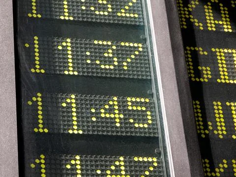 Simple train or bus station time table, different arrival and departure hours Stock Photos