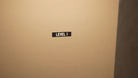 Simple wall with level I sign indoors Stock Footage 276341804