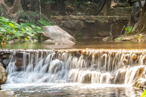 A simple waterfall and river in forest Stock Photos