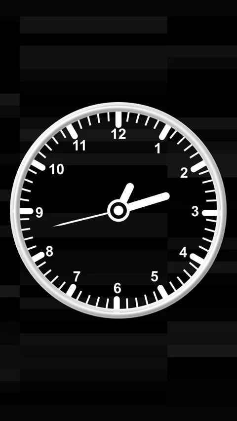A simple white analog clock face with a dark textured background and white .. Stock Footage 344859670
