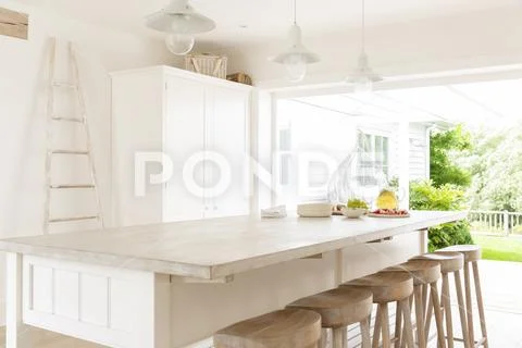 Simple white and wood home showcase kitchen Stock Photos