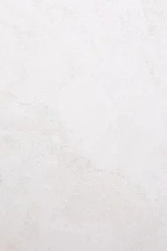 Simple white marble texture with subtle veins and natural patterns showcasing Stockfoto's