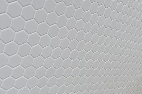 A simple white texture pattern of hexagons as a background イラスト素材
