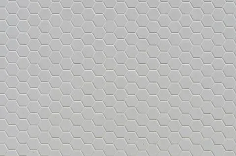 A simple white texture pattern of hexagons as a background Stock Photos