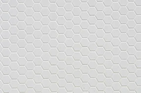 A simple white texture pattern of hexagons as a background Stock Photos