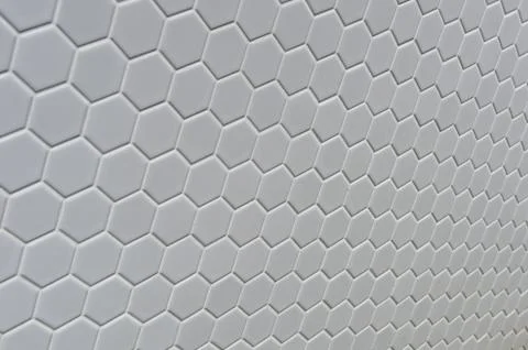 A simple white texture pattern of hexagons as a background Stock Photos