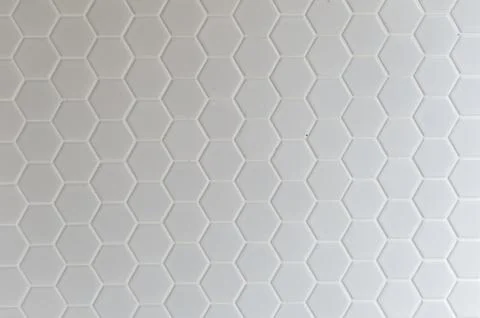 A simple white texture pattern of hexagons as a background 스톡 사진
