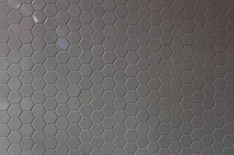 A simple white texture pattern of hexagons as a background 写真素材