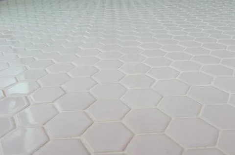 A simple white texture pattern of hexagons as a background Stock Photos