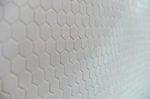 A simple white texture pattern of hexagons as a background 스톡 사진