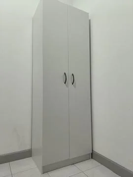 A simple white wardrobe Stock Photos