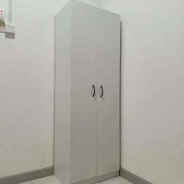 A simple white wardrobe Stock Photos