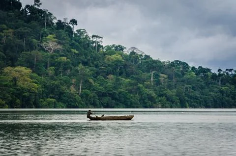 Simple wooden dugout canoe on Barombi Mbo crater lake of Cameroon, Africa Stock Photos