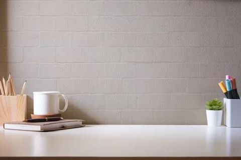 Simple workplace with coffee cup, notebook and stationery.Copy space for yo.. Foto stock