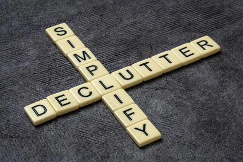 Simplify and declutter crossword simplify and declutter crossword in ivory... Stock Photos