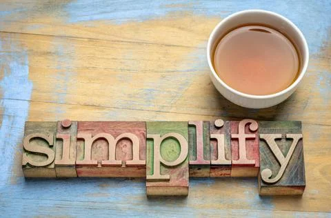 Simplify - minimalism concept simplify - text in letterpress wood type wit... Stock Photos