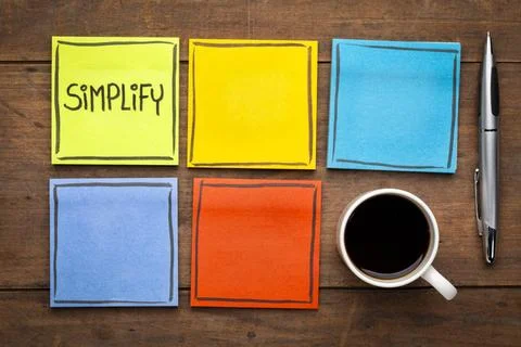 Simplify - task management concept. Simplify - task management concept. Ha... Stock Photos