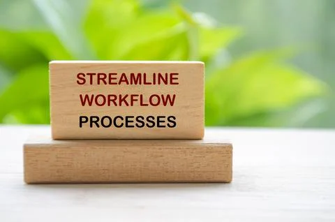Simplify Workflow Processes text on wooden blocks representing continuous I.. Stock Photos
