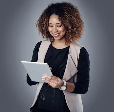 Simplifying business operations with smart technology. Studio shot of a young Stock Photos
