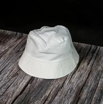 The simplistic charm of a white blank bucket hat brings understated eleganc.. Stock Photos