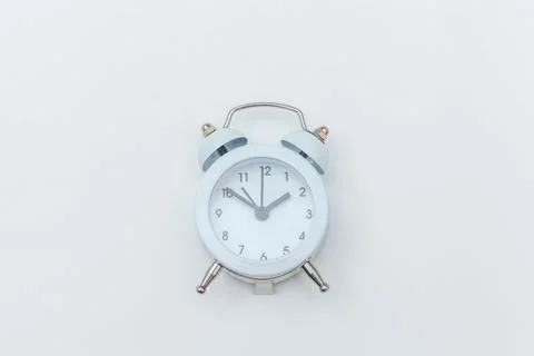 Simply flat lay design Ringing twin bell vintage classic alarm clock Isolat.. Stock Photos