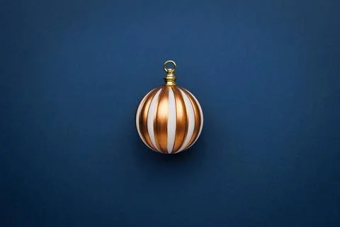 Simply minimal composition winter object ornament ball on color background Stock Photos