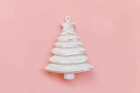 Simply minimal composition winter objects ornament fir tree isolated on pink  Stock Photos