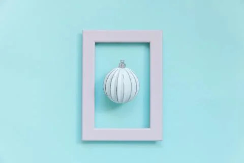 Simply minimal composition winter objects ornament ball in pink frame isolate 스톡 사진