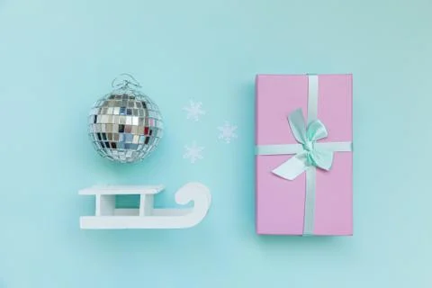 Simply minimal composition winter objects ornament ball sled gift box isolate Stock Photos