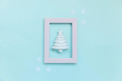 Simply minimal composition winter objects ornament fir tree in pink frame iso Stock Photos