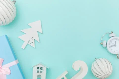 Simply minimal composition winter objects ornament sled fir tree ball gift bo Stock Photos