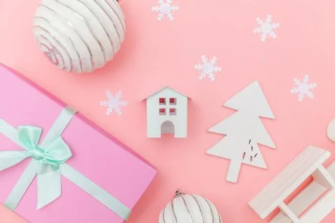 Simply minimal composition winter objects ornament sled fir tree ball gift bo Stock Photos