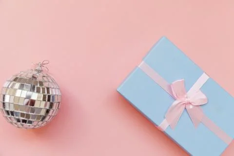 Simply minimal composition winter objects ornament ball gift box isolated on  Stock Photos