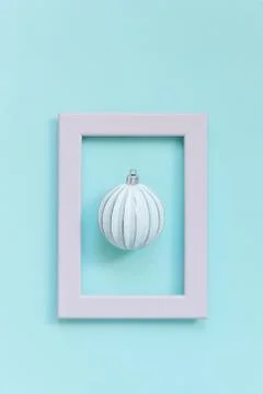 Simply minimal composition winter objects ornament ball in pink frame isolate 스톡 사진