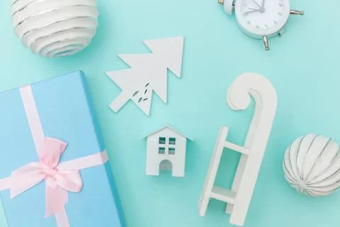 Simply minimal composition winter objects ornament sled fir tree ball gift bo Stock Photos