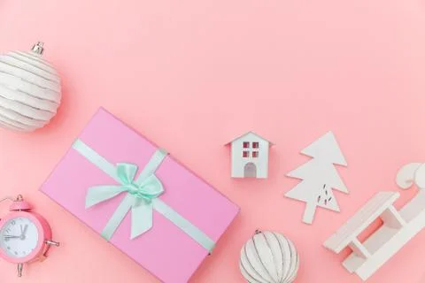 Simply minimal composition winter objects ornament sled fir tree ball gift bo Stock Photos