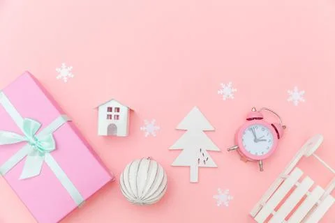 Simply minimal composition winter objects ornament sled fir tree ball gift bo Stock Photos