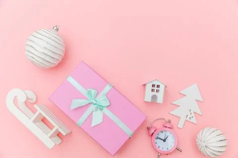 Simply minimal composition winter objects ornament sled fir tree ball gift bo Stock Photos