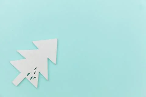 Simply minimal composition winter objects ornament fir tree isolated on blue  Stock Photos