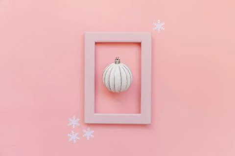 Simply minimal composition winter objects ornament ball in pink frame isolate 스톡 사진
